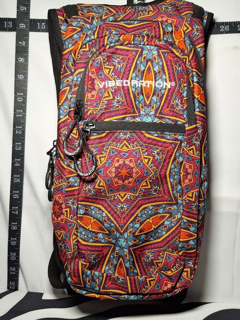 Vibedration Hydration Backpack w/o bladder - Blue/Red/Orange pattern - Used